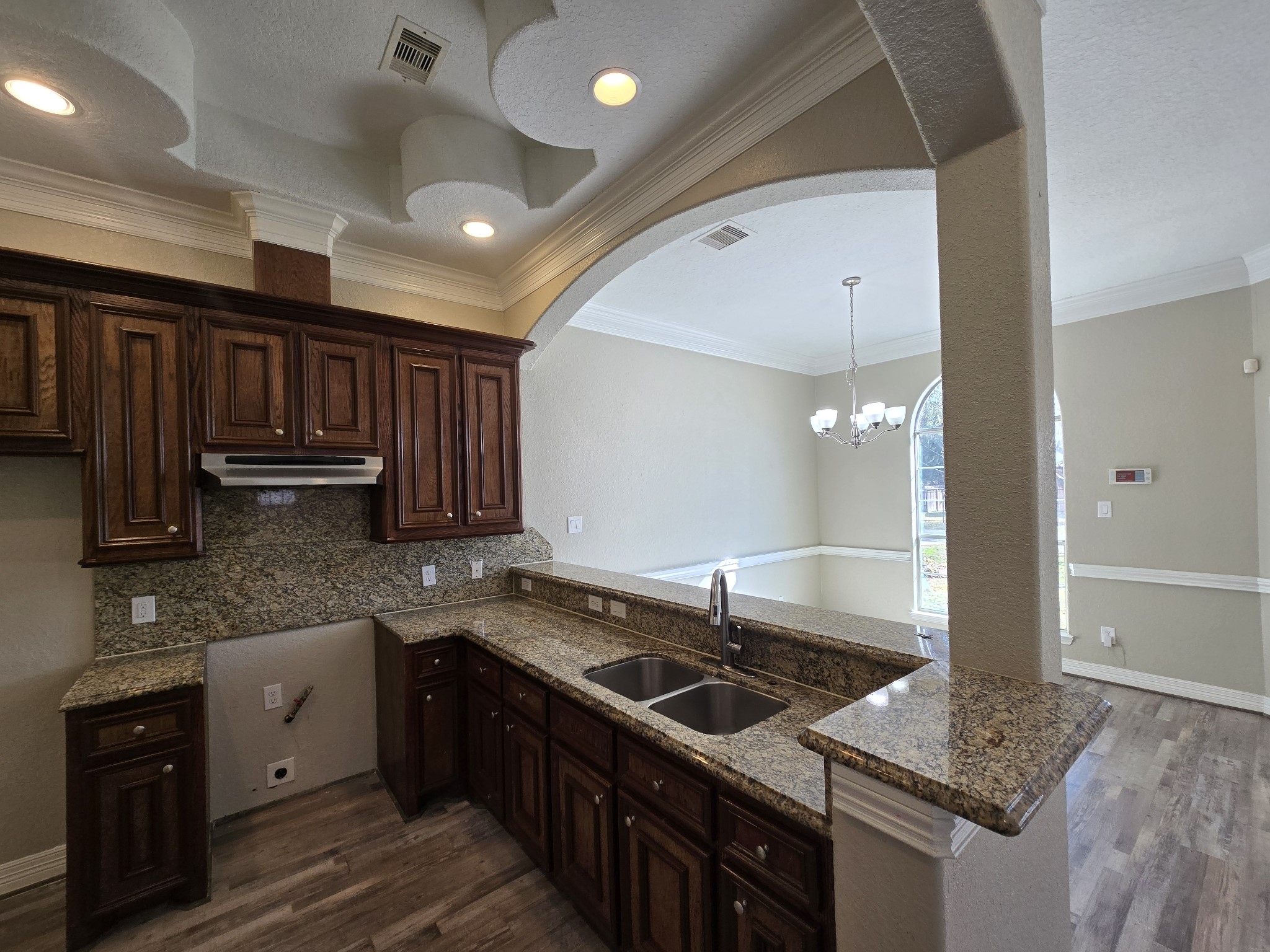 6324 Anderson Road, Unit A Houston, TX 77085 - Photo 10 of 18 a kitchen with stainless steel appliances granite countertop a sink stove and cabinets
