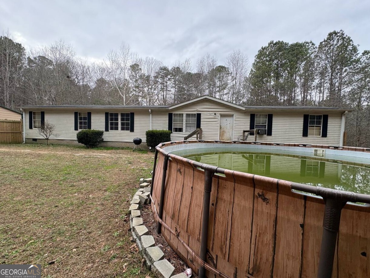 798 Williamson Road Tallapoosa, GA 30176 - Photo 32 of 73 a house view with a garden space