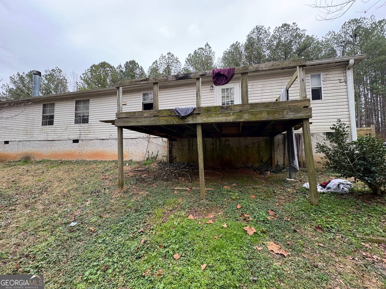 798 Williamson Road Tallapoosa, GA 30176 - Photo 4 of 73 a view of a house with backyard and sitting area