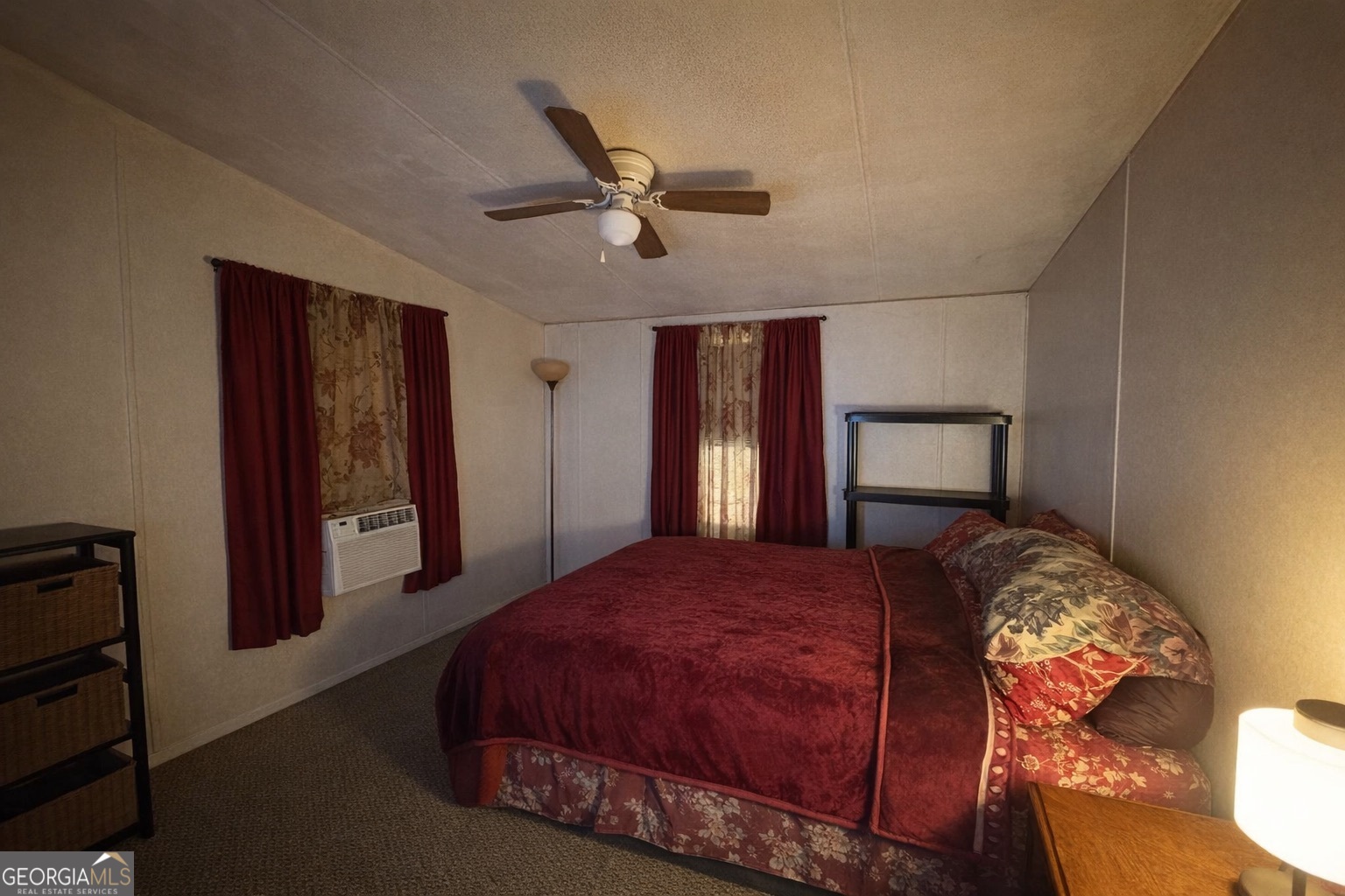 798 Williamson Road Tallapoosa, GA 30176 - Photo 53 of 73 a bedroom with a bed and a mirror