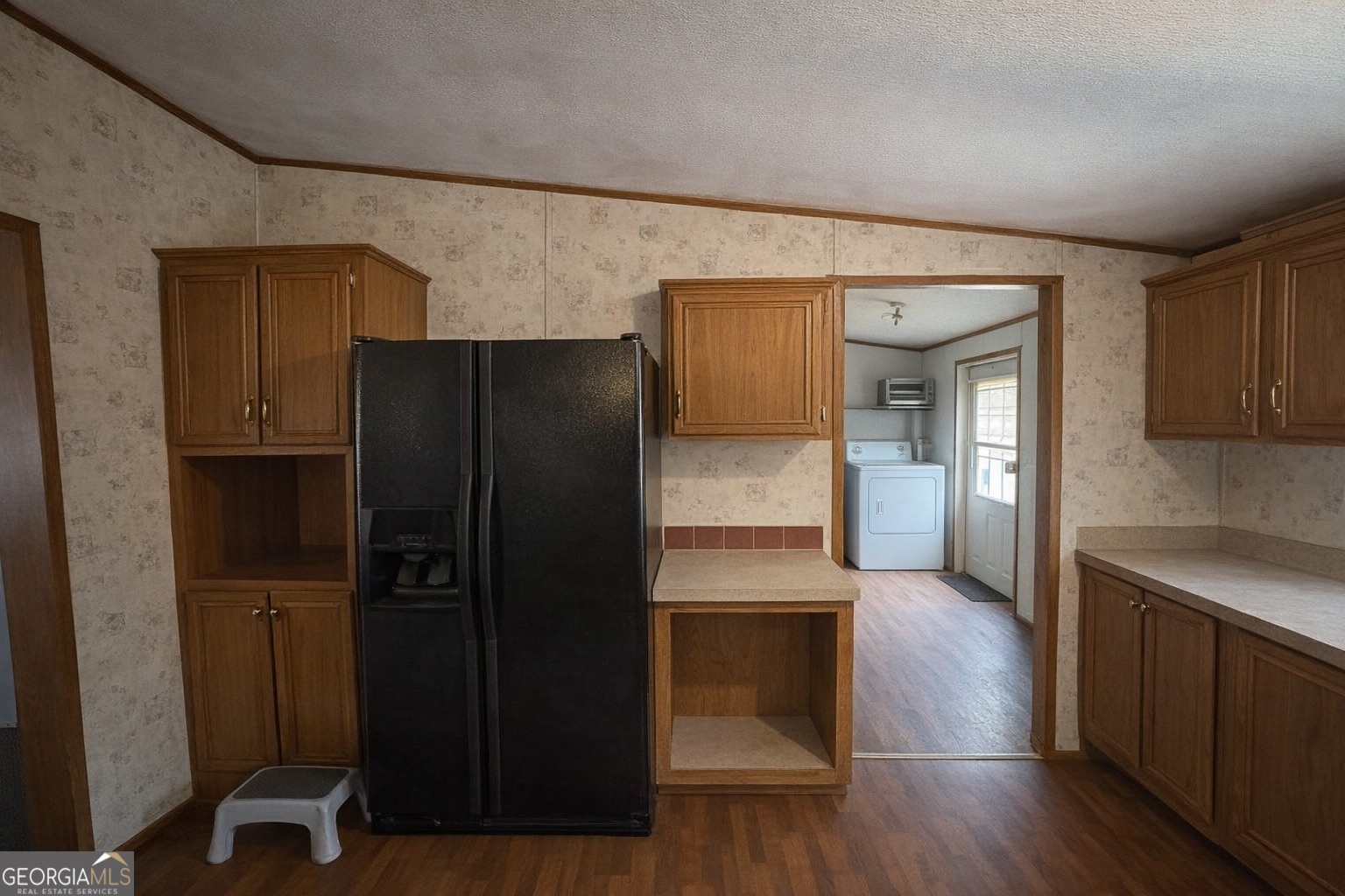 798 Williamson Road Tallapoosa, GA 30176 - Photo 68 of 73 a kitchen with a refrigerator and a sink