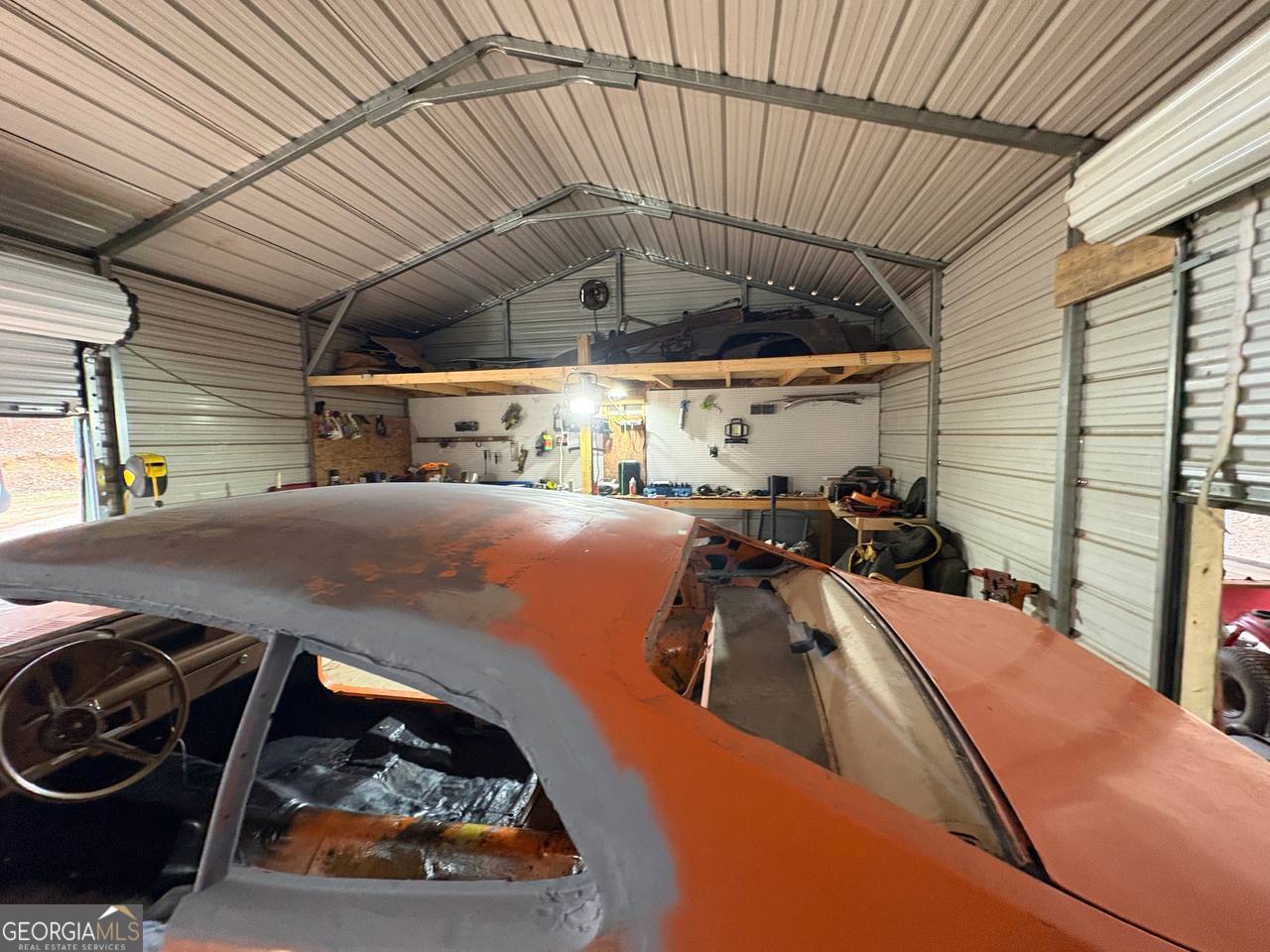 798 Williamson Road Tallapoosa, GA 30176 - Photo 7 of 73 a view of a gym with large trees