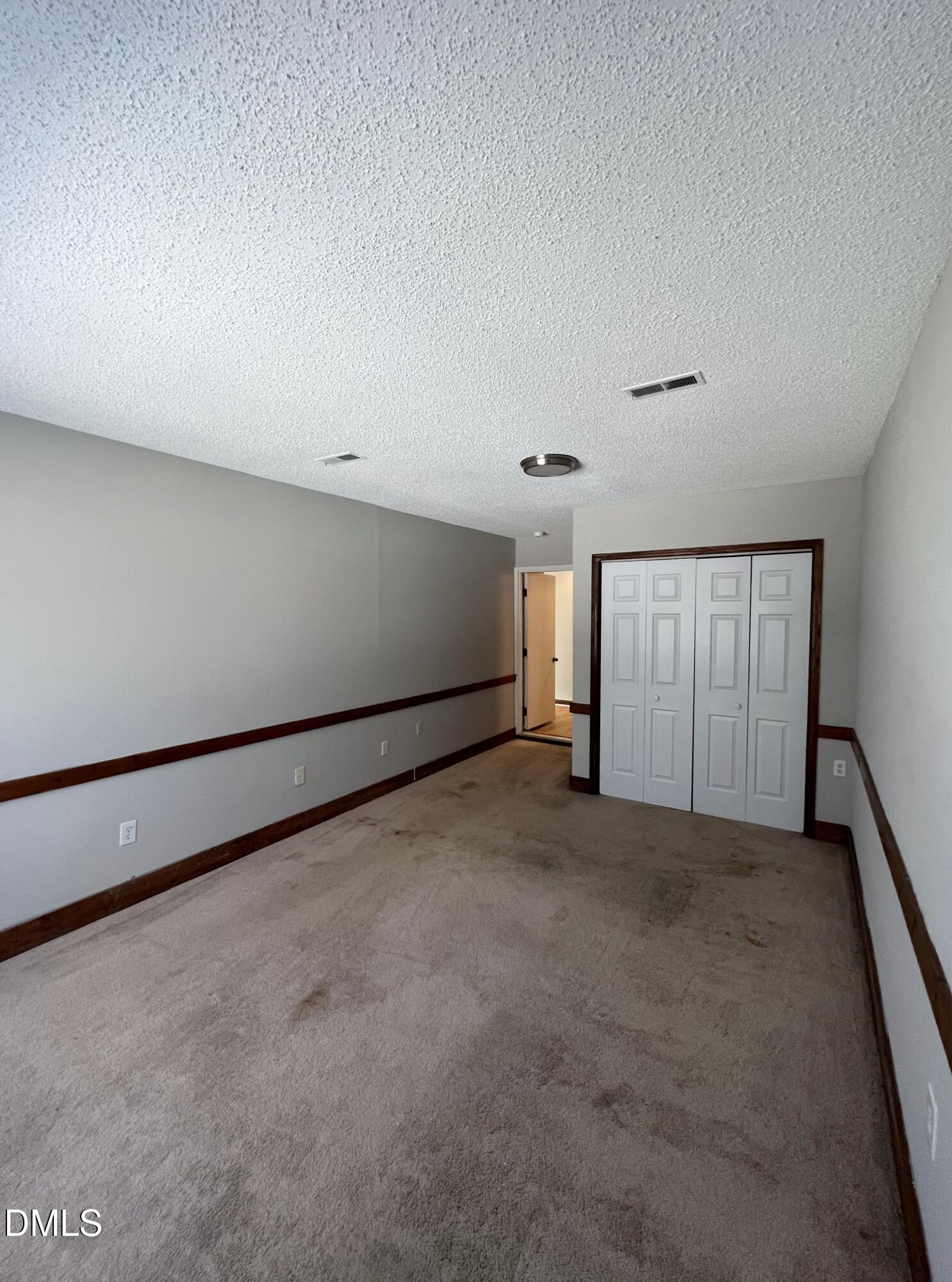 4305 Hunters Club Drive Raleigh, NC 27606 - Photo 6 of 12 a view of empty room