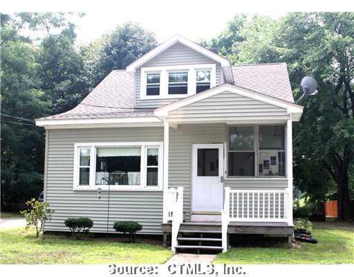 3 Manning Road Enfield, CT 06082 - Photo 1 of 1 a front view of a house with a yard