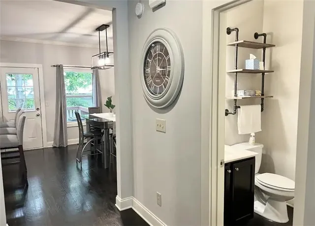 a view of a hallway with washer and dryer