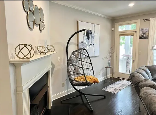 a view of a livingroom with furniture and windows