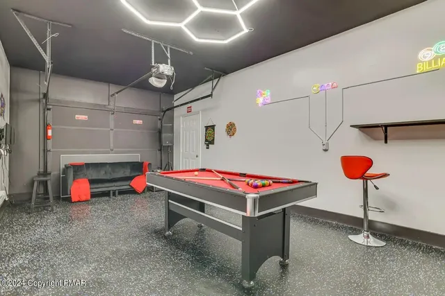 a room with table and gym equipment