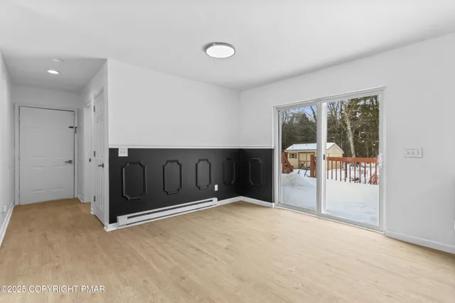 a view of a lake with outdoor seating