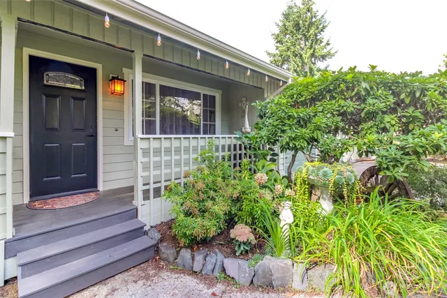 front view of a house with a garden