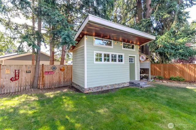 a front view of house with garden