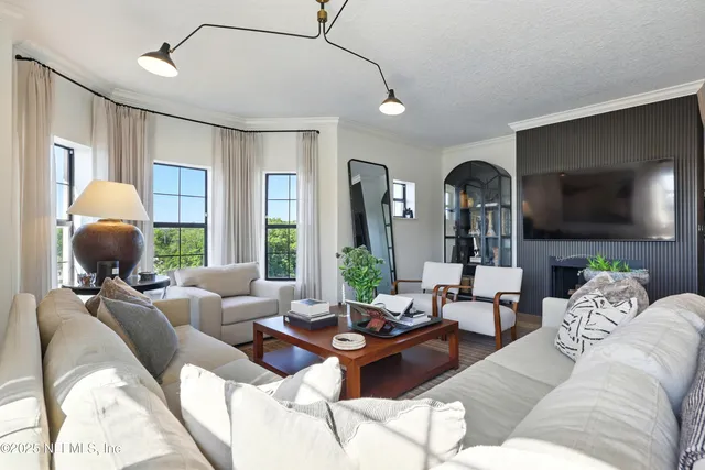 a room with gym equipment and a window