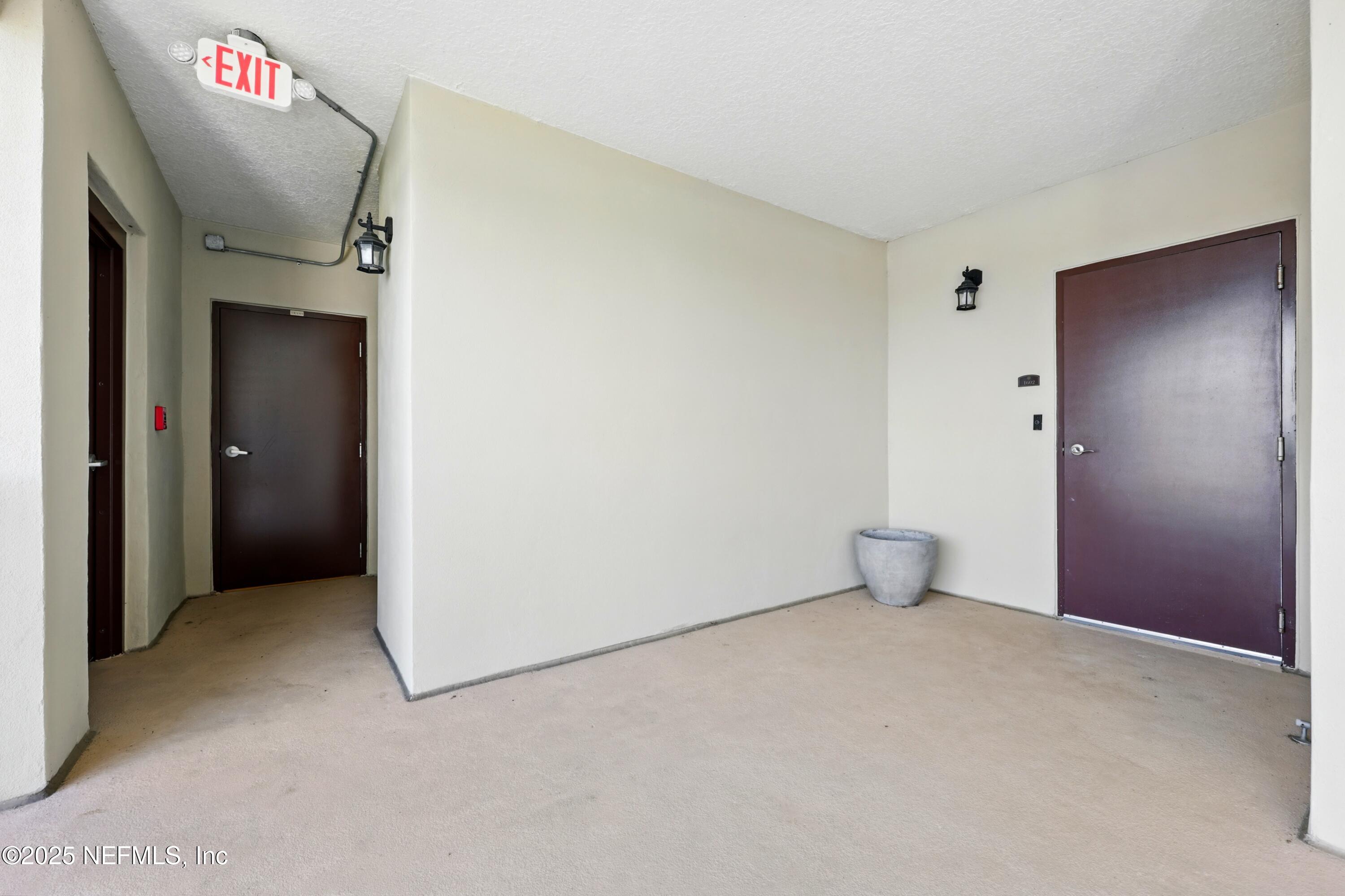 3958 Baymeadows Road, Unit 1602 Jacksonville, FL 32217 - Photo 52 of 89 Trash and Back Stairs