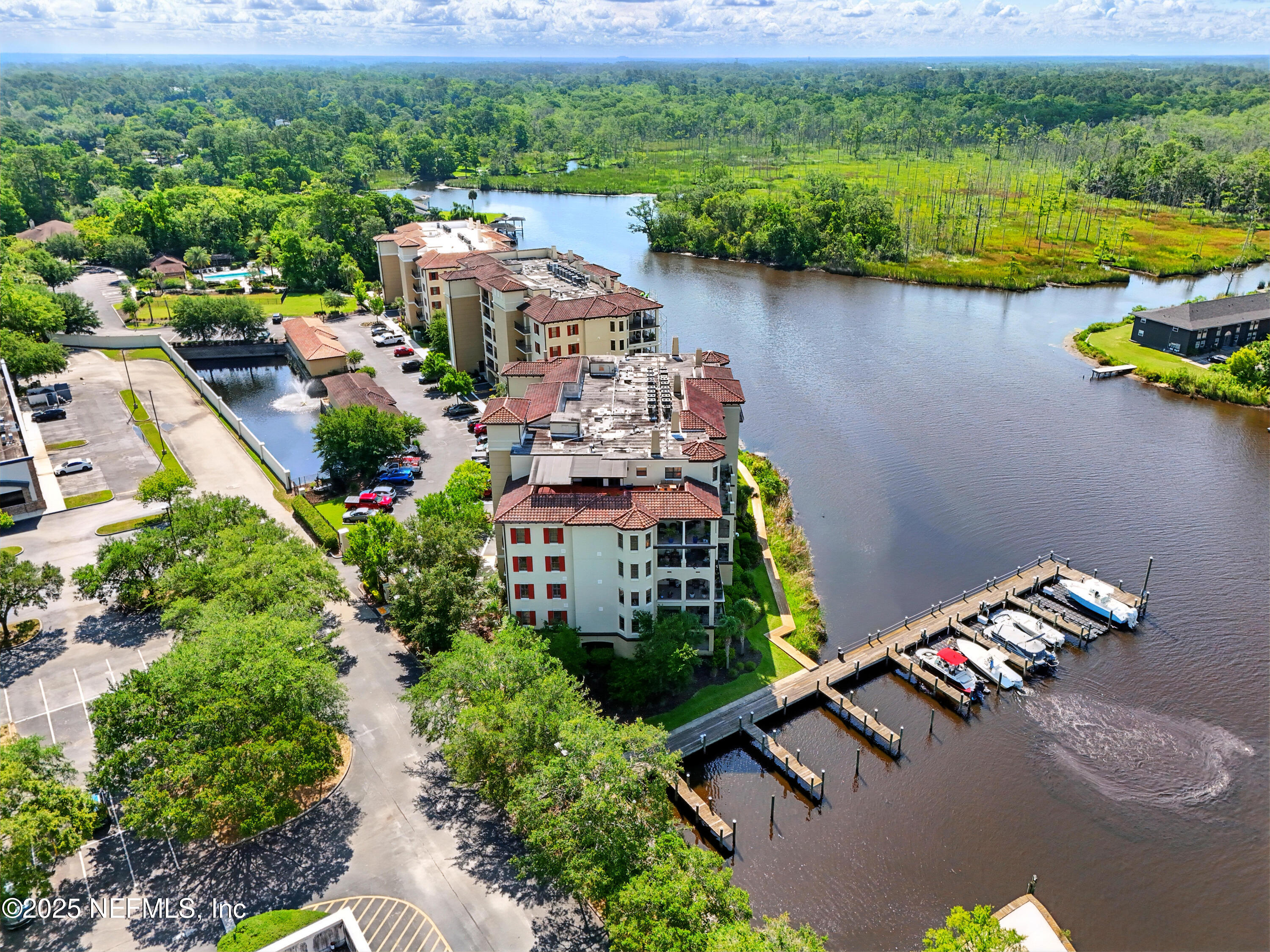 3958 Baymeadows Road, Unit 1602 Jacksonville, FL 32217 - Photo 59 of 89 an aerial view of a house with a lake view