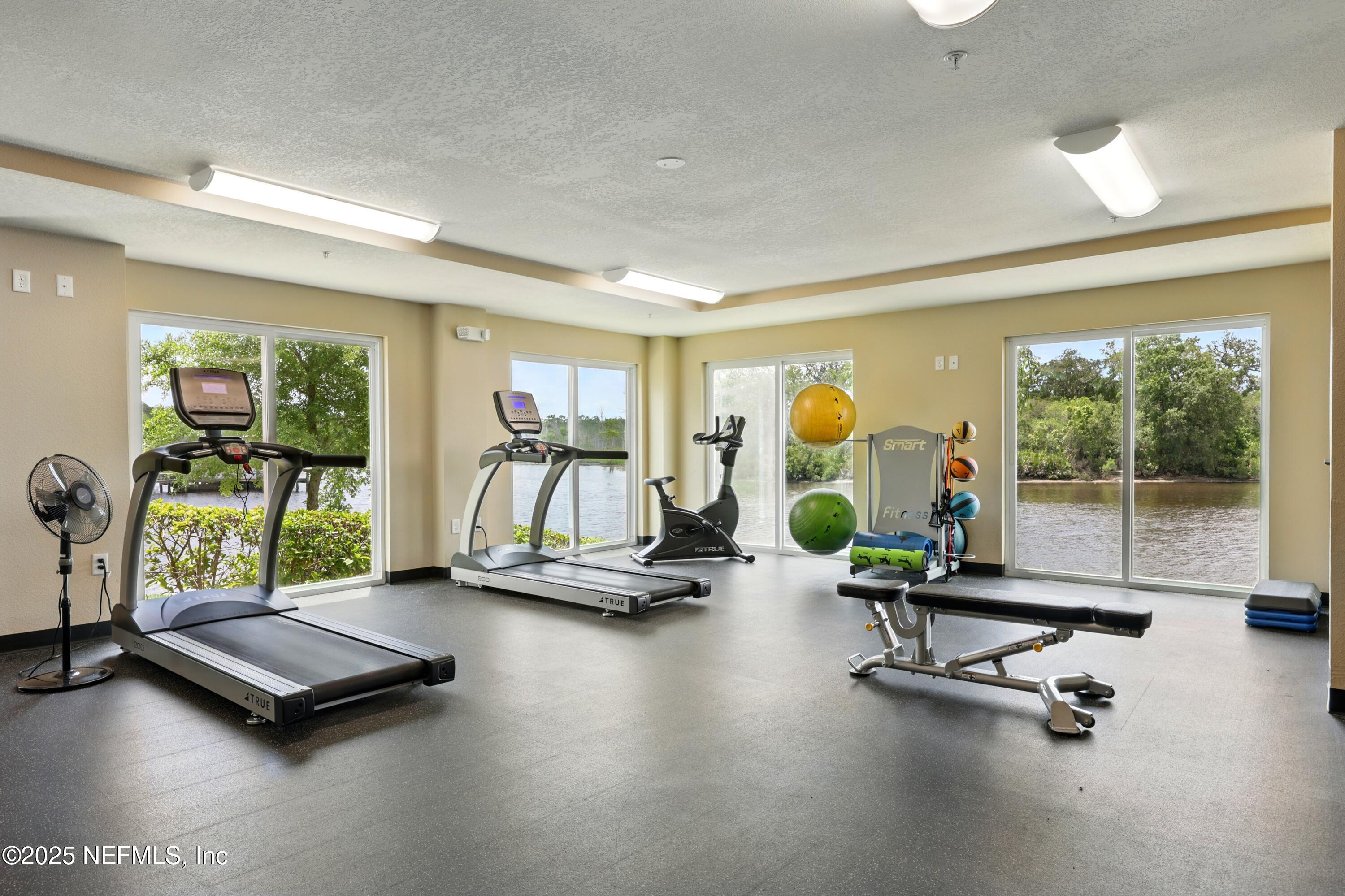 3958 Baymeadows Road, Unit 1602 Jacksonville, FL 32217 - Photo 84 of 89 a view of a room with gym equipment