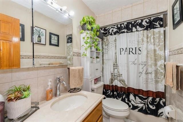 1012 Paterson Plank Road, Unit 1 North Bergen, NJ 07047 - Photo 10 of 13 a bathroom with a sink a toilet and shower