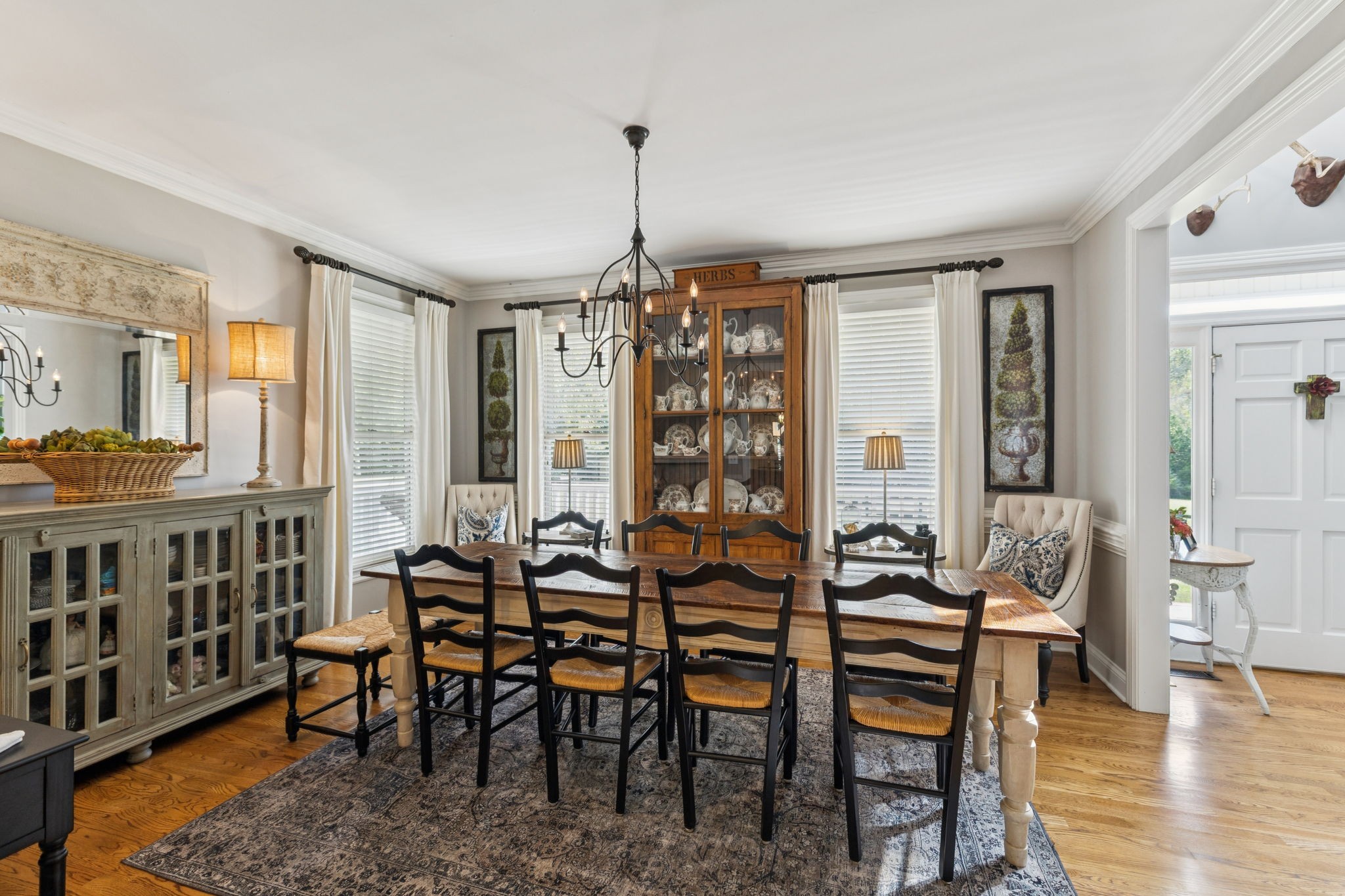 1909 Dr Robinson Rd Spring Hill Thompson's Station, TN 37179 - Photo 19 of 72 a view of a dining room with furniture window and wooden floor