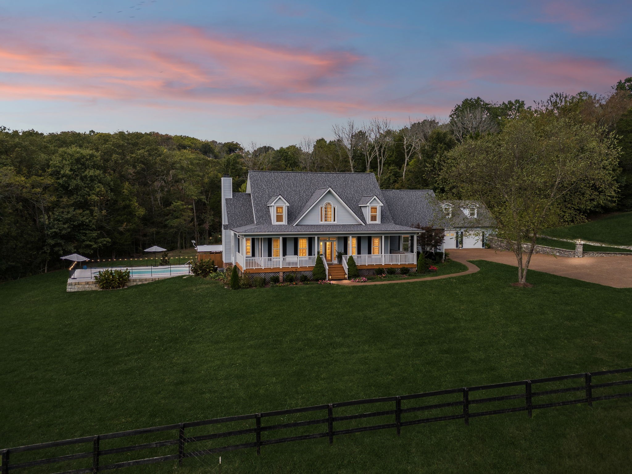 1909 Dr Robinson Rd Spring Hill Thompson's Station, TN 37179 - Photo 2 of 72 a view of a house with a big yard