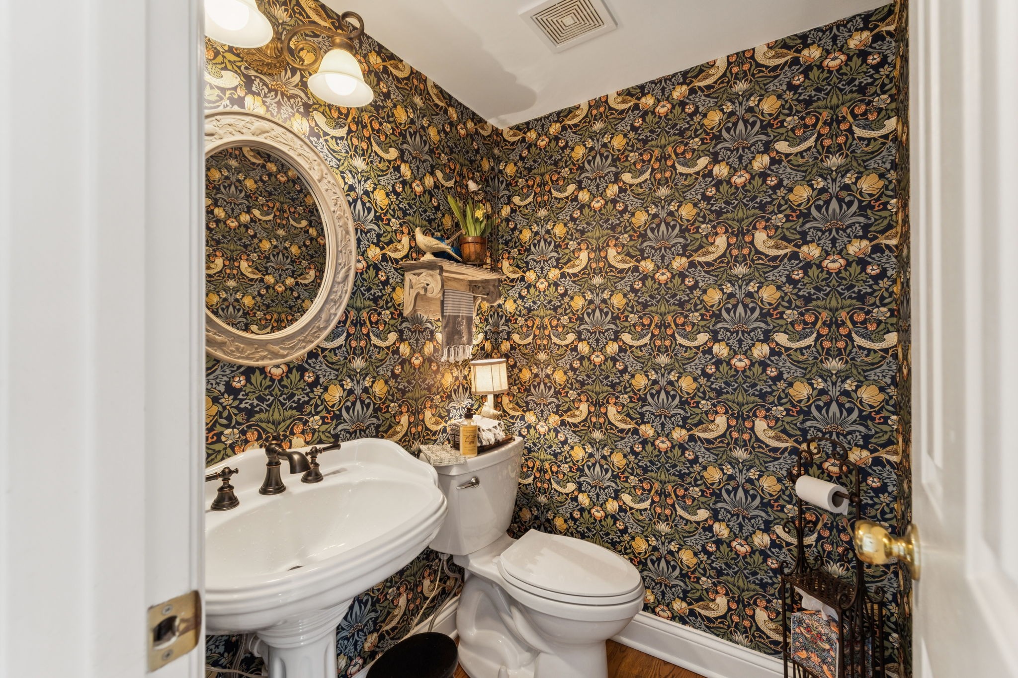 1909 Dr Robinson Rd Spring Hill Thompson's Station, TN 37179 - Photo 34 of 72 a bathroom with a sink toilet and a mirror