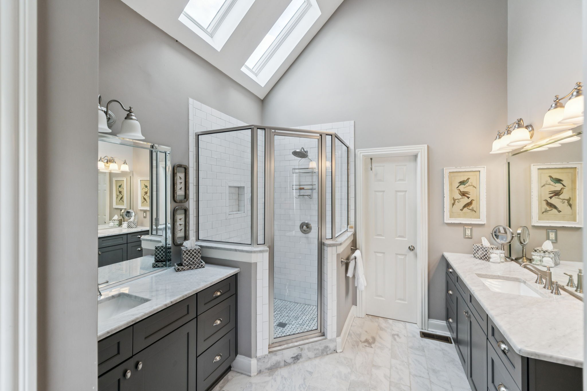 1909 Dr Robinson Rd Spring Hill Thompson's Station, TN 37179 - Photo 37 of 72 a spacious bathroom with a granite countertop sink a mirror and a shower