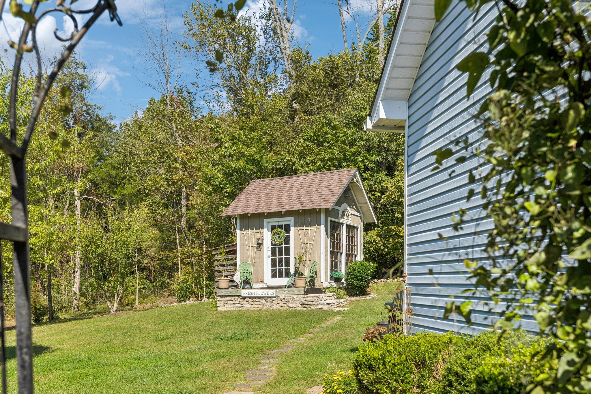 1909 Dr Robinson Rd Spring Hill Thompson's Station, TN 37179 - Photo 63 of 72 a front view of a house with a yard