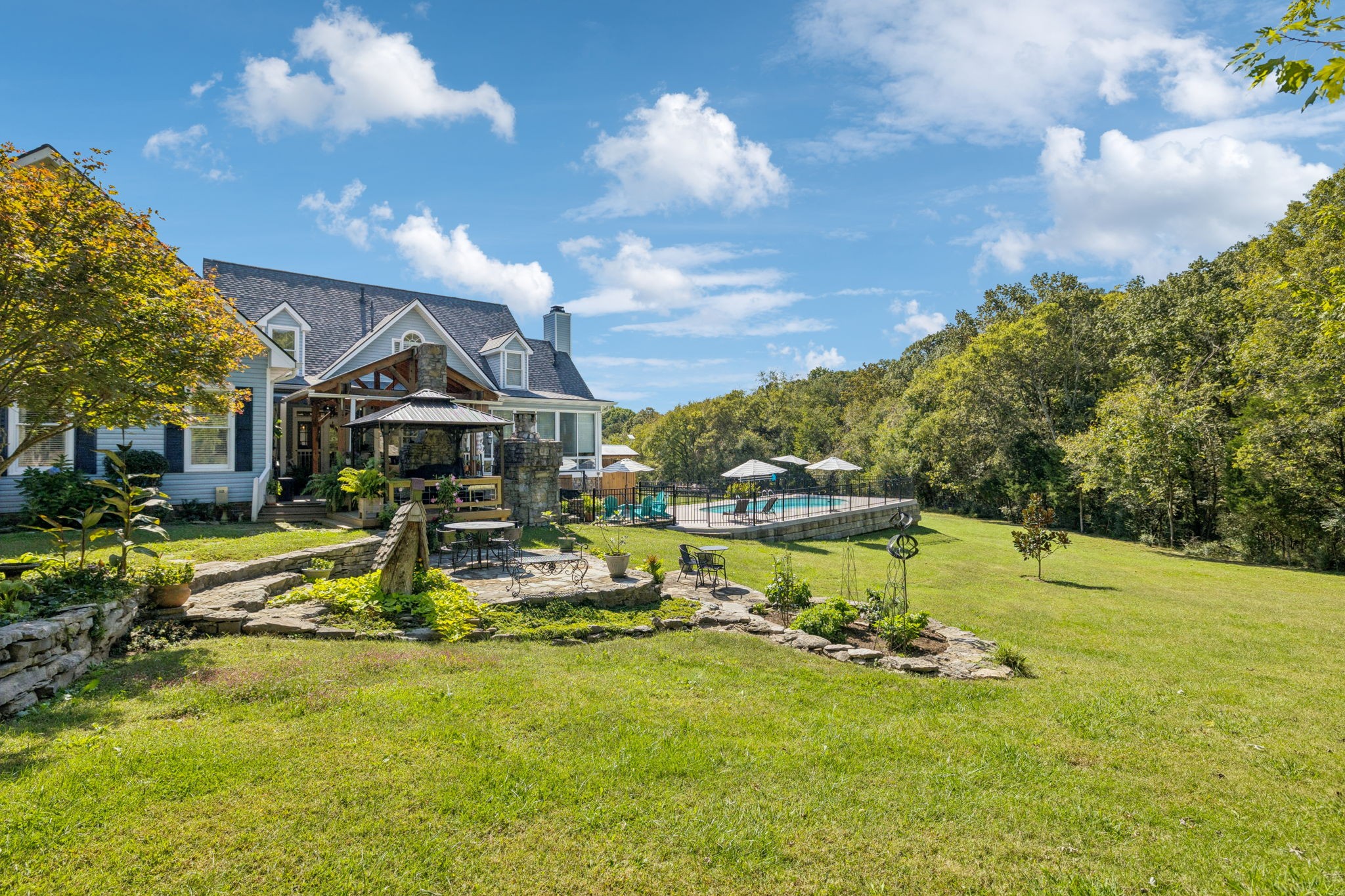 1909 Dr Robinson Rd Spring Hill Thompson's Station, TN 37179 - Photo 66 of 72 a view of a house with yard and lake view