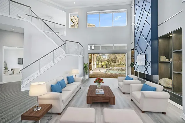 a spacious bathroom with a double vanity sink a mirror and a shower