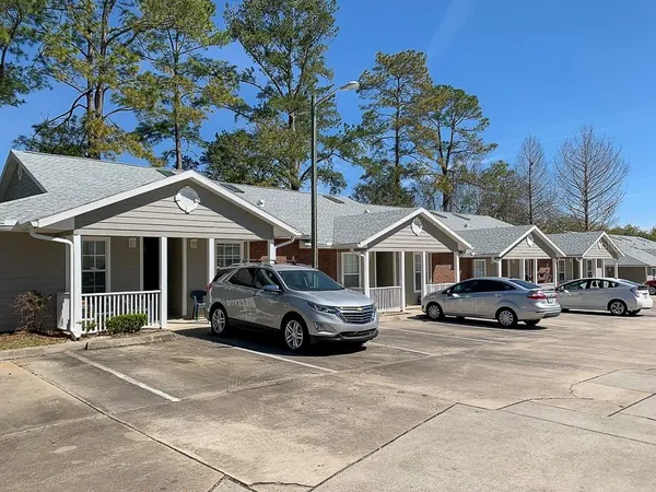 a car parked in front of a house