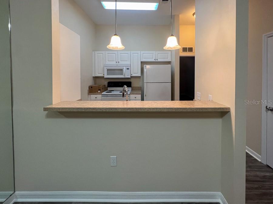 4014 Southwest 26th Drive, Unit 27 Gainesville, FL 32608 - Photo 5 of 15 a view of a kitchen with a sink