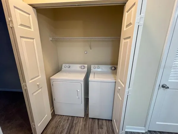 a utility room with dryer and washer