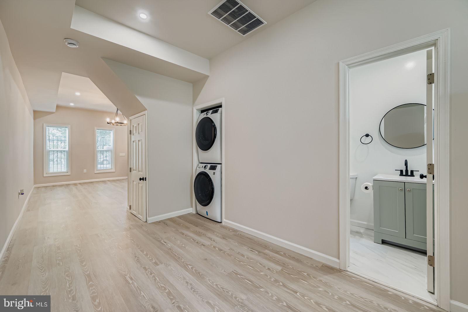 1729 North Fulton Avenue Baltimore, MD 21217 - Photo 11 of 30 a bathroom with a sink and a mirror