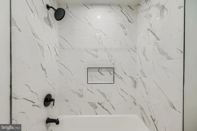 a bathroom with a bathtub