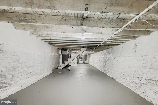 a view of a room with a wooden floor