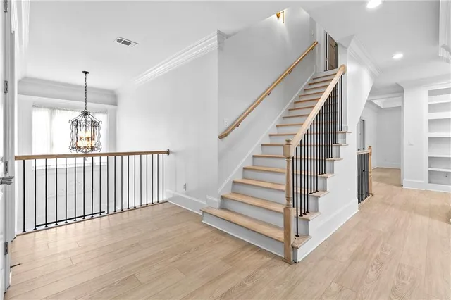 a bedroom with a bed and a table