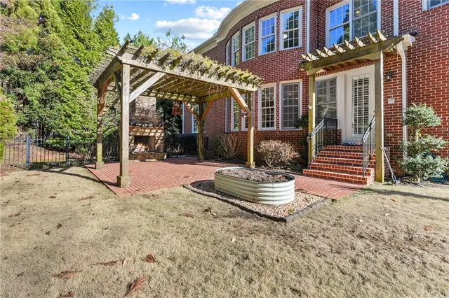 an aerial view of a house swimming pool and outdoor space