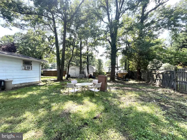 a view of a backyard with a garden