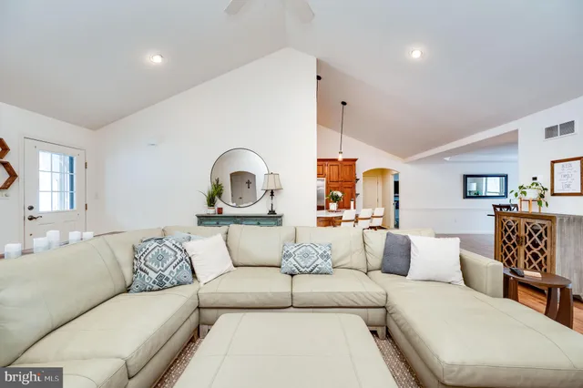 a work room with furniture and a window