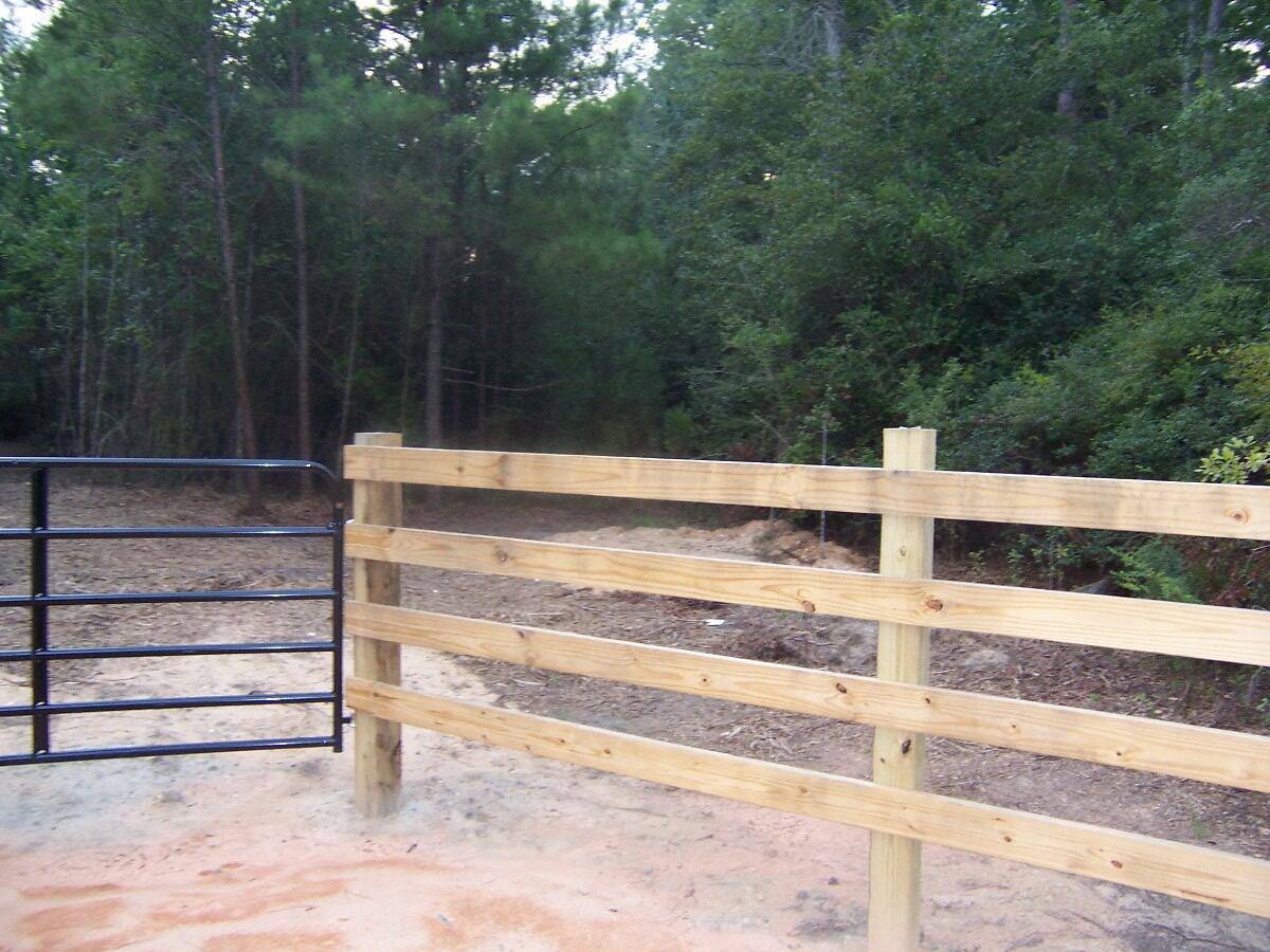 40-ac Cooks Mill Road Bonifay, FL 32425 - Photo 12 of 30 a view of backyard with wooden fence and a bench