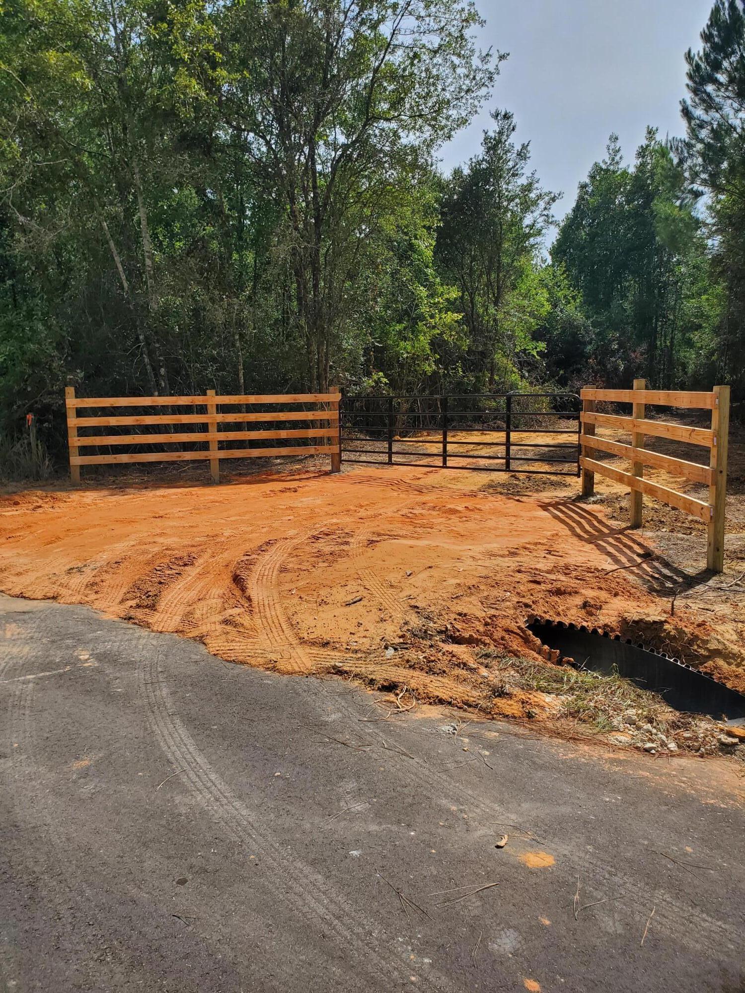 40-ac Cooks Mill Road Bonifay, FL 32425 - Photo 2 of 30 a backyard of a house with lots of green space