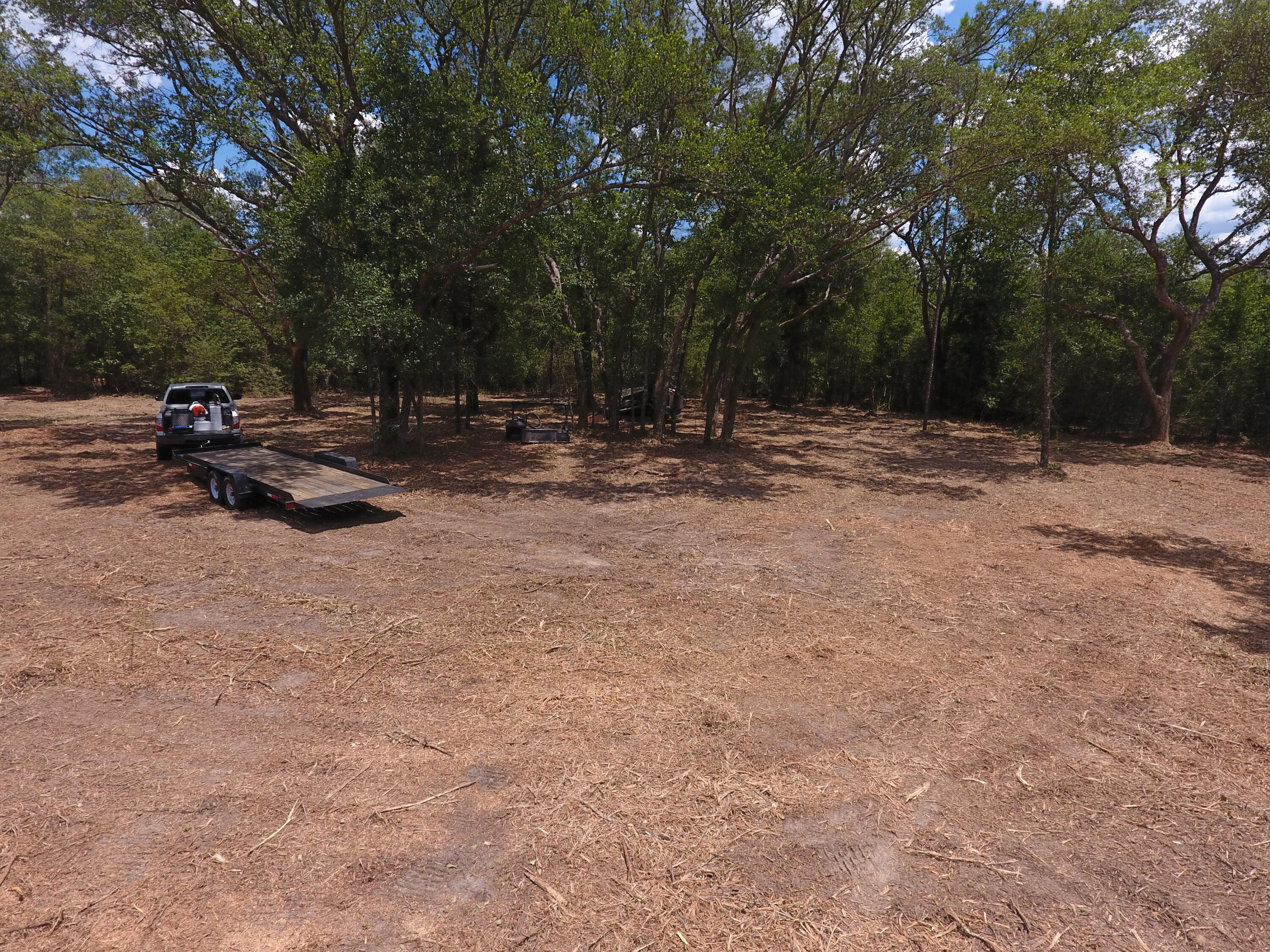 40-ac Cooks Mill Road Bonifay, FL 32425 - Photo 7 of 30 a view of backyard with a table and chairs with wooden fence