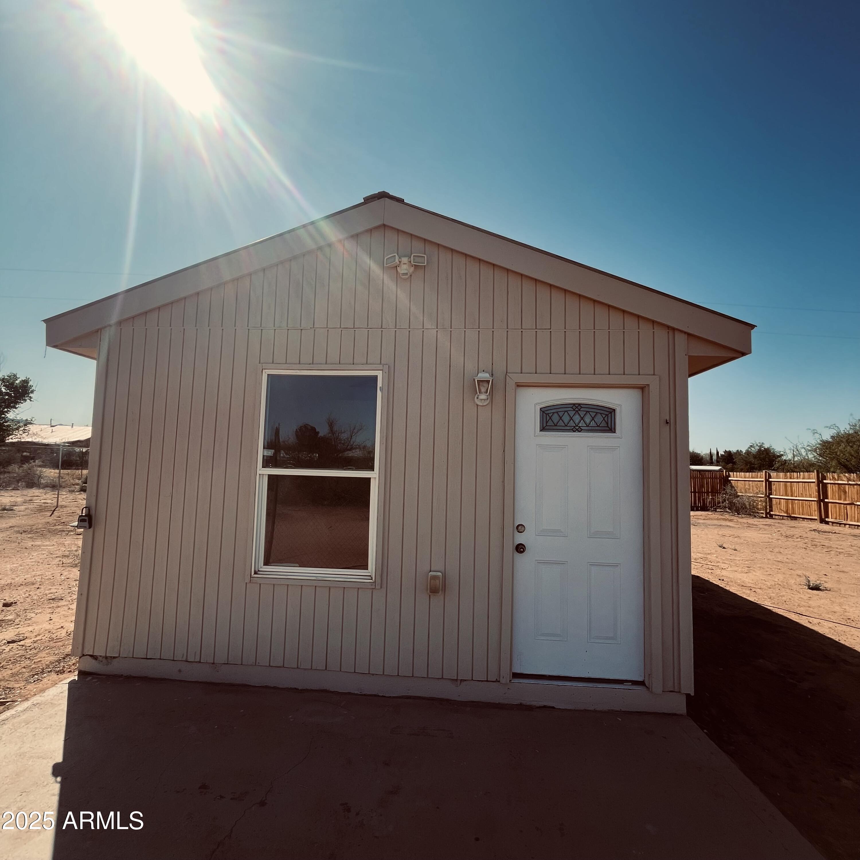 330 2nd Street Bowie, AZ 85605 - Photo 1 of 10 a front view of a house with a yard