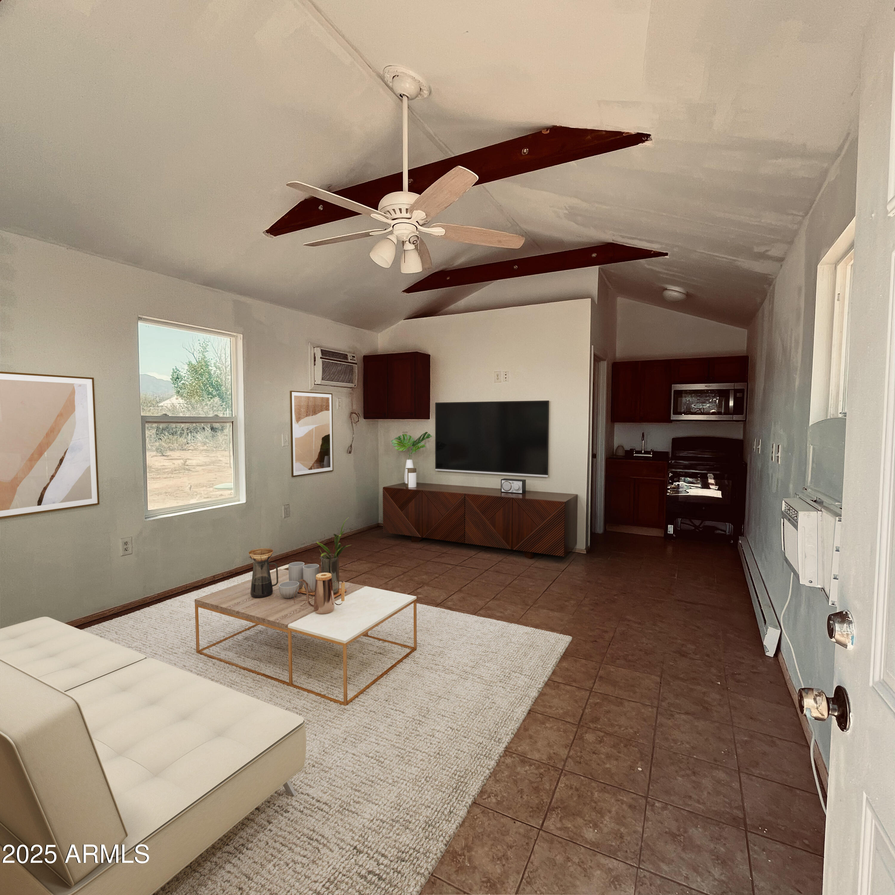 330 2nd Street Bowie, AZ 85605 - Photo 10 of 10 a living room with furniture and a flat screen tv