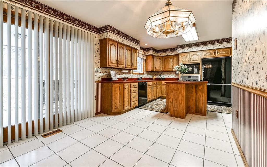 1254 Cornplanter Road Cabot, PA 16023 - Photo 5 of 23 The Kitchen / Dining Room is right beyond the Living Room.