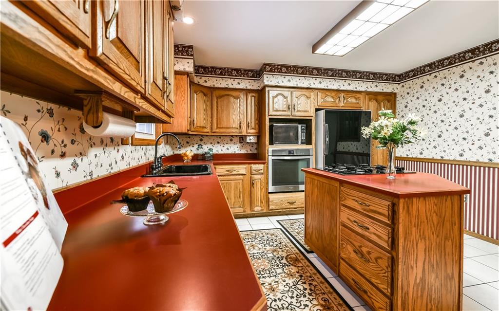 1254 Cornplanter Road Cabot, PA 16023 - Photo 7 of 23 Extra storage and counter space in the kitchen island.