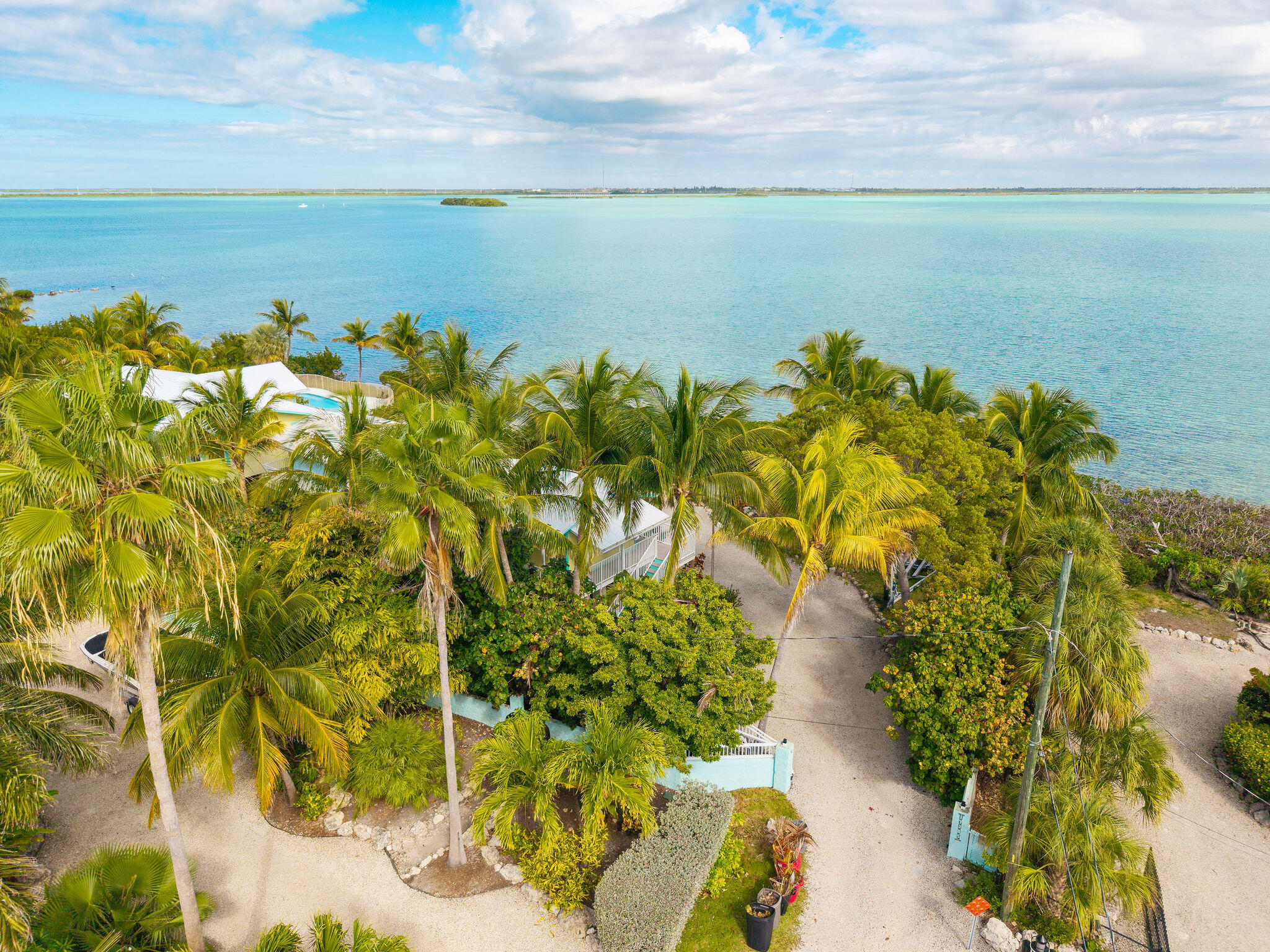 17385 Keystone Road Sugarloaf, FL 33042 - Photo 26 of 74 a view of a lake with a beach