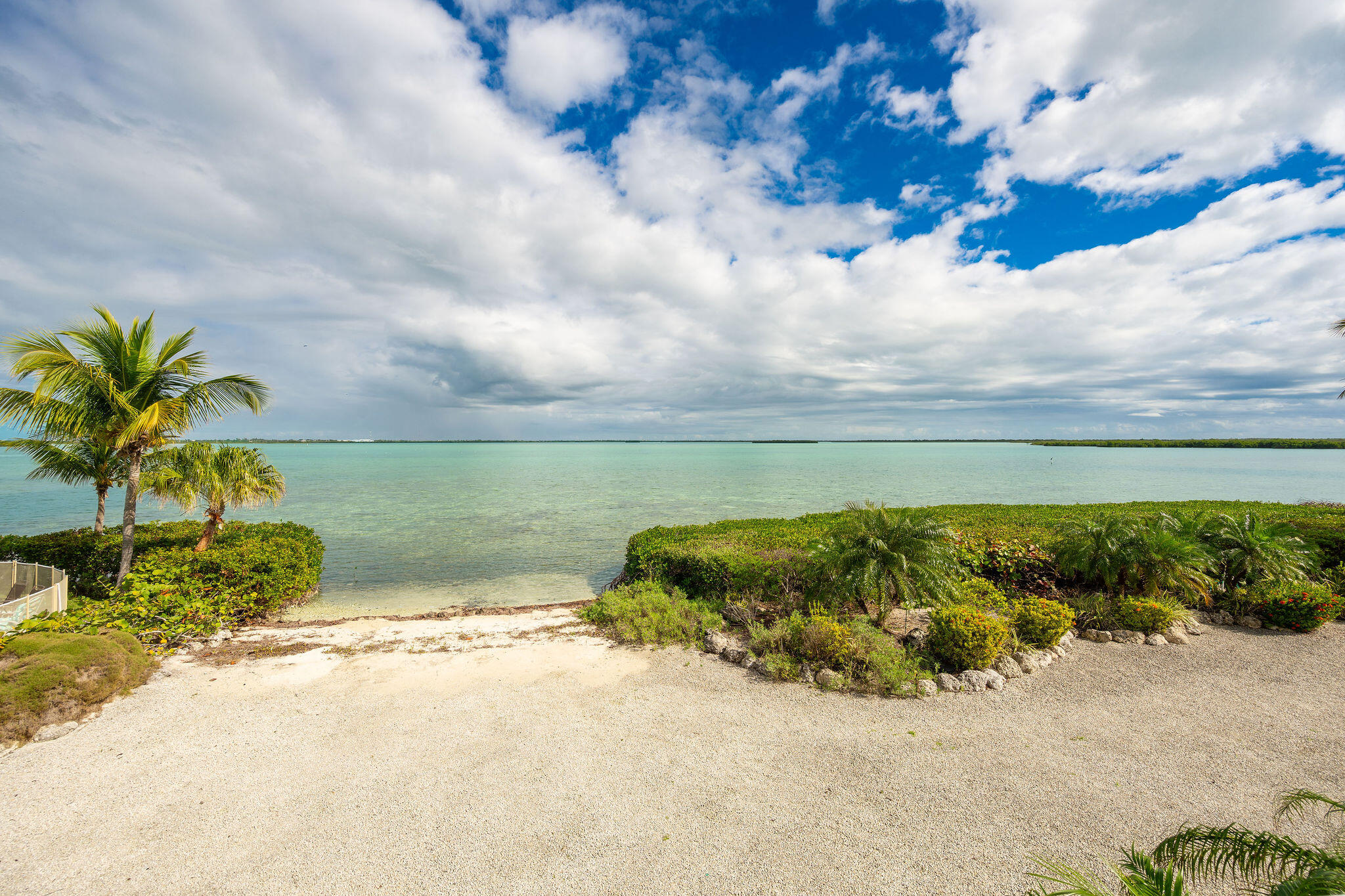 17385 Keystone Road Sugarloaf, FL 33042 - Photo 51 of 74 a view of a lake with a yard