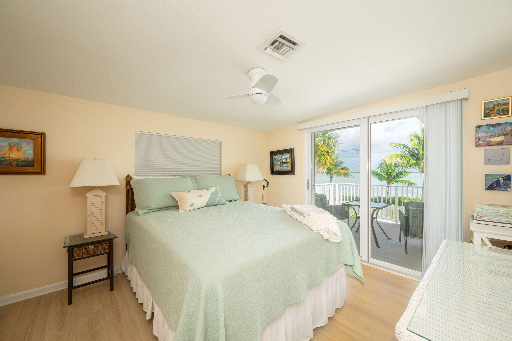 17385 Keystone Road Sugarloaf, FL 33042 - Photo 58 of 74 a bedroom with a bed and a large window