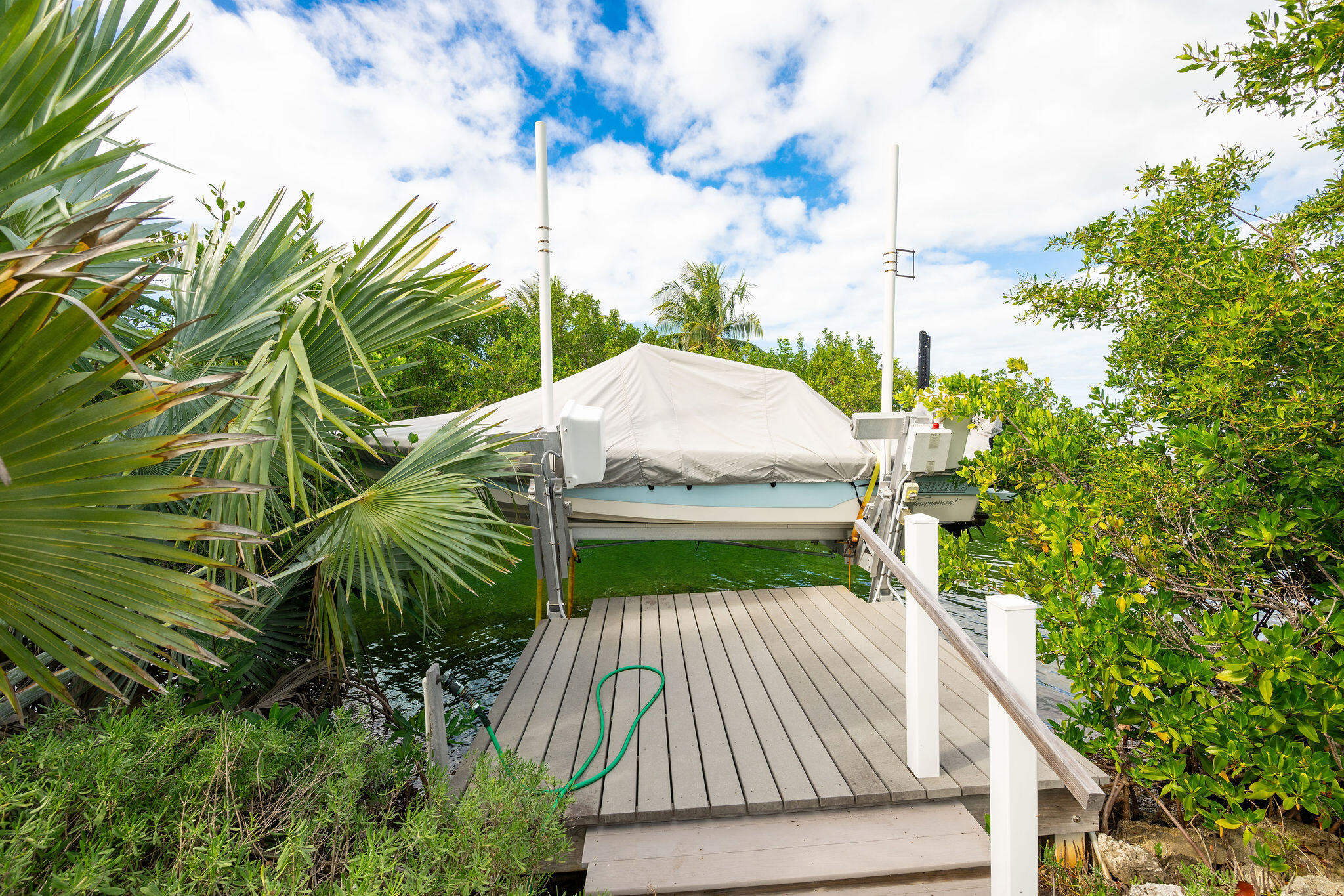 17385 Keystone Road Sugarloaf, FL 33042 - Photo 74 of 74 a view of backyard with swimming pool and outdoor seating