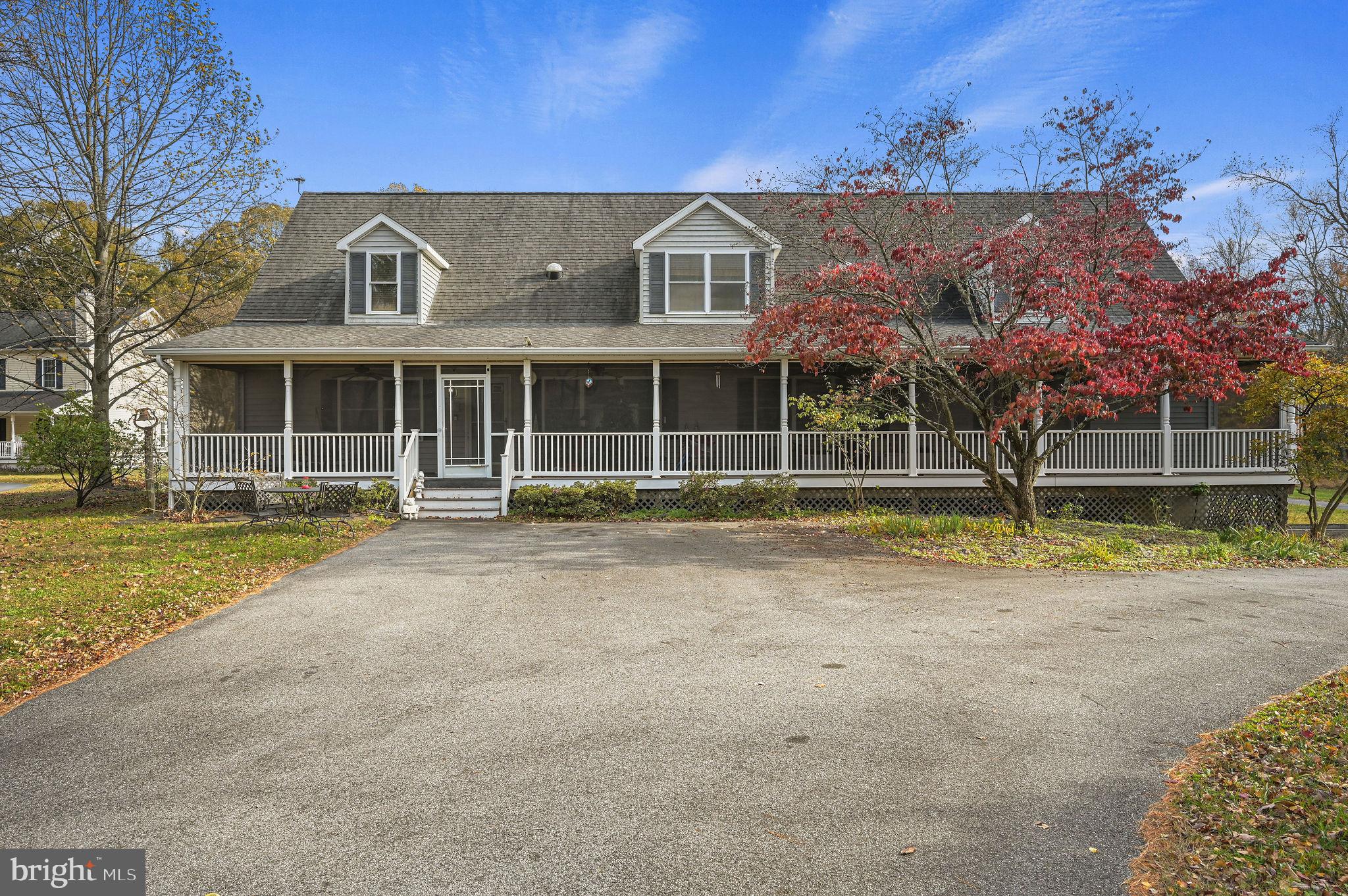 850 Arthursville Road Hartly, DE 19953 - Photo 2 of 35 a front view of a house with a yard