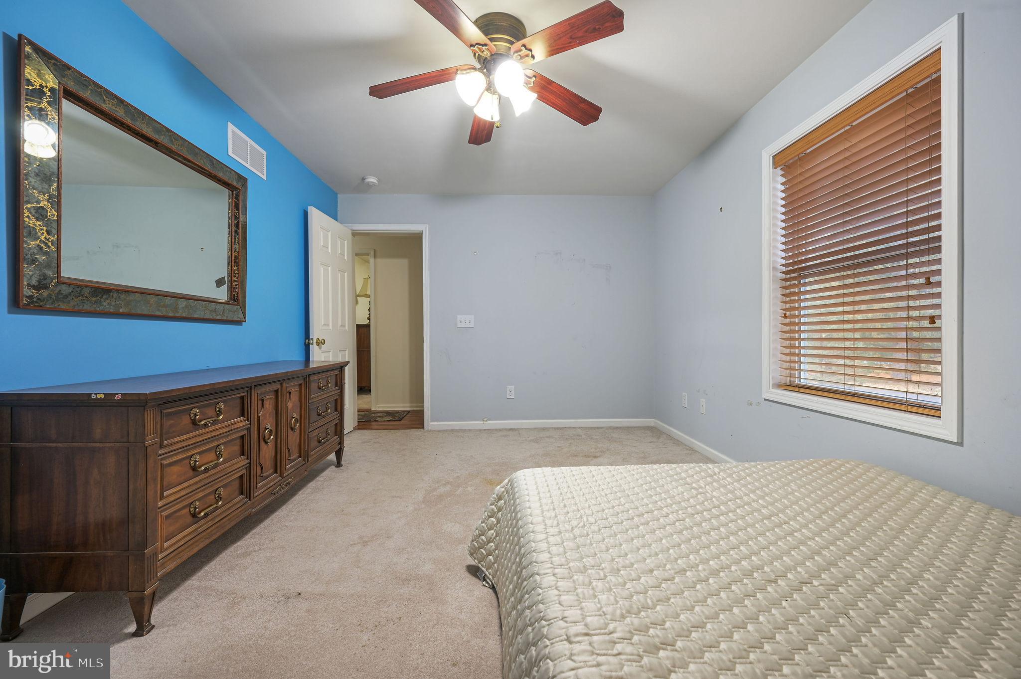 850 Arthursville Road Hartly, DE 19953 - Photo 23 of 35 a bedroom with a bed dresser and a window