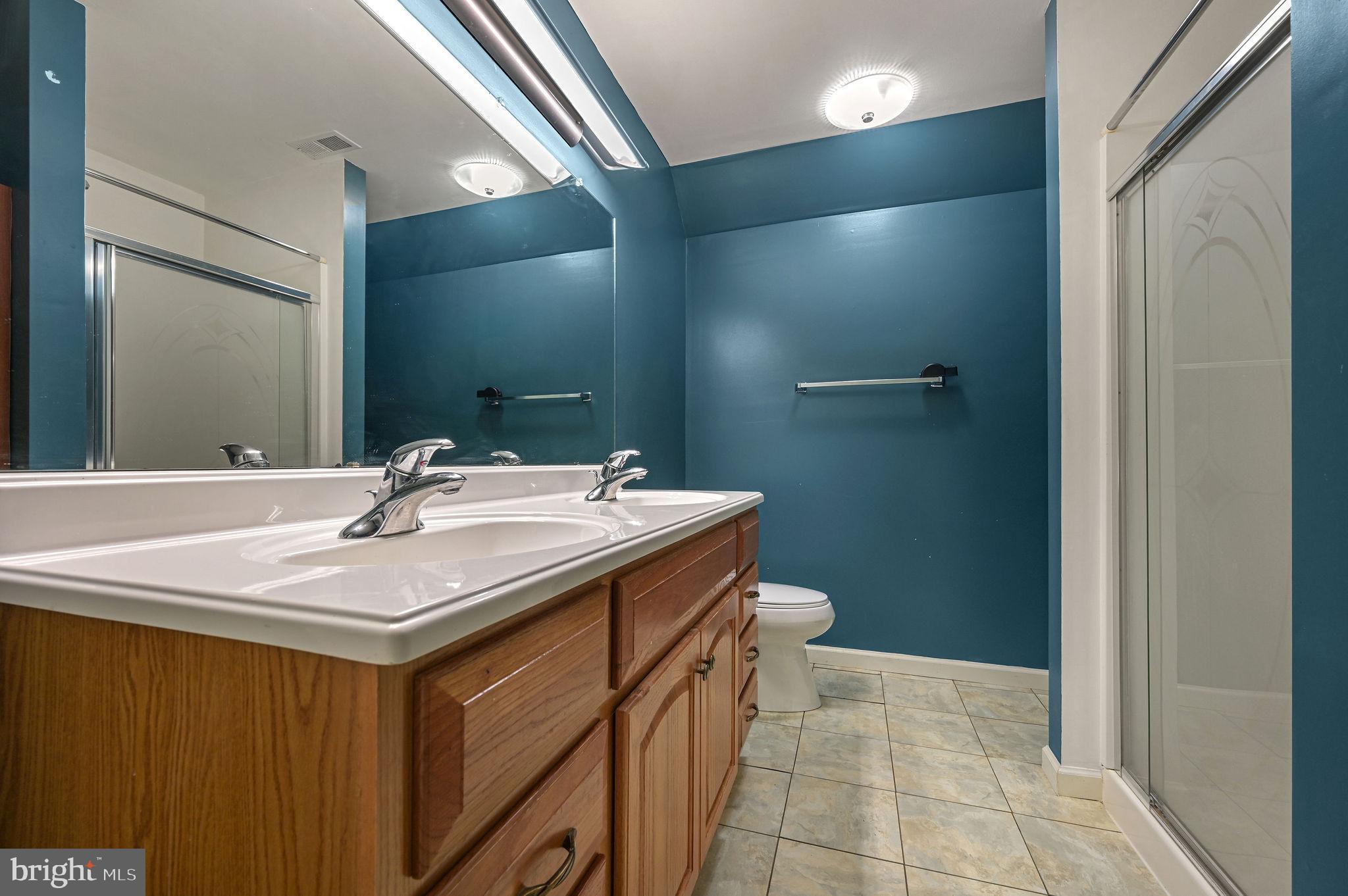 850 Arthursville Road Hartly, DE 19953 - Photo 26 of 35 a bathroom with a sink and a mirror